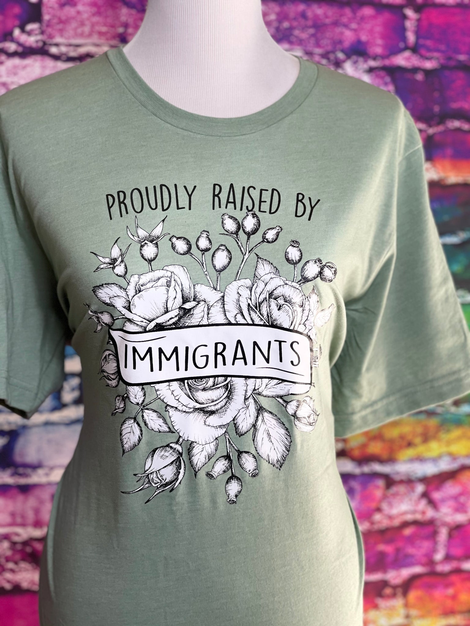 Raised by Immigrants Graphic Tee